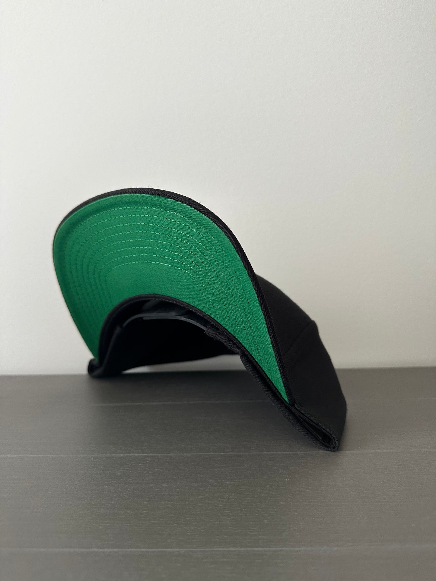 Adult Yupoong Flat Beak Snapback with GREEN undervisor